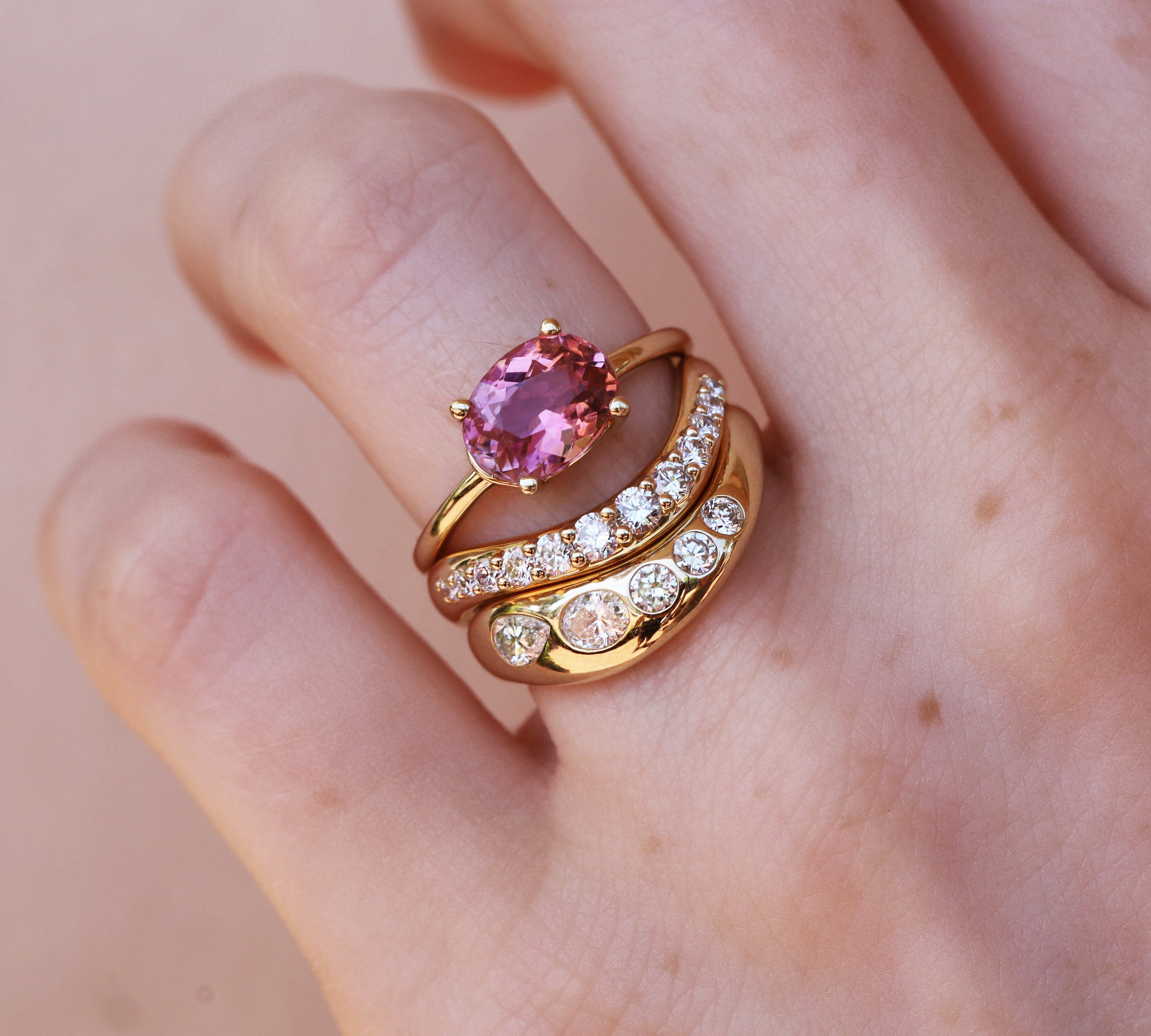 1.80ct Pink Tourmaline Hazel Ring [Yellow Gold] on hand with diamond stacking bands
