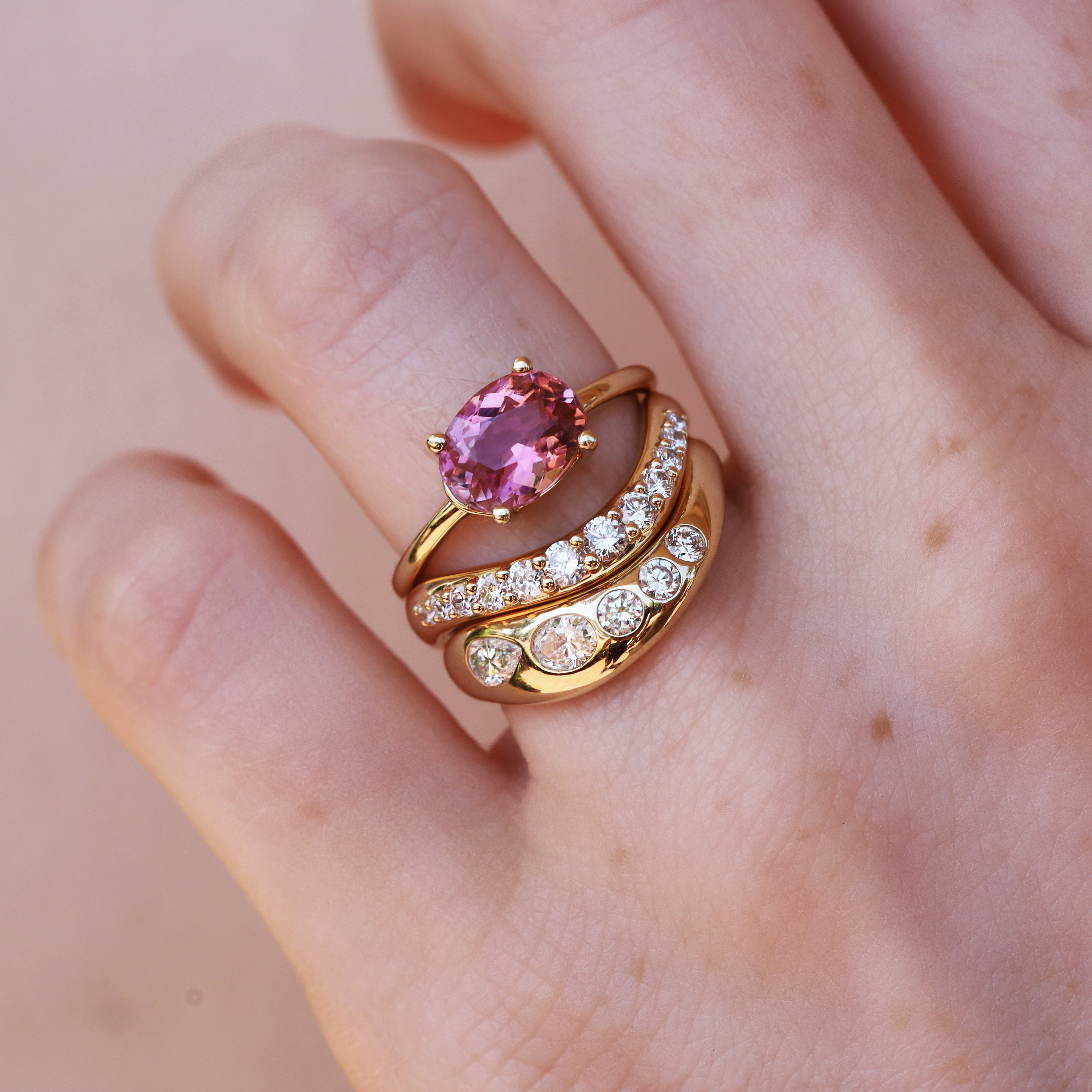 1.80ct Pink Tourmaline Hazel Ring [Yellow Gold] on hand with diamond stacking bands