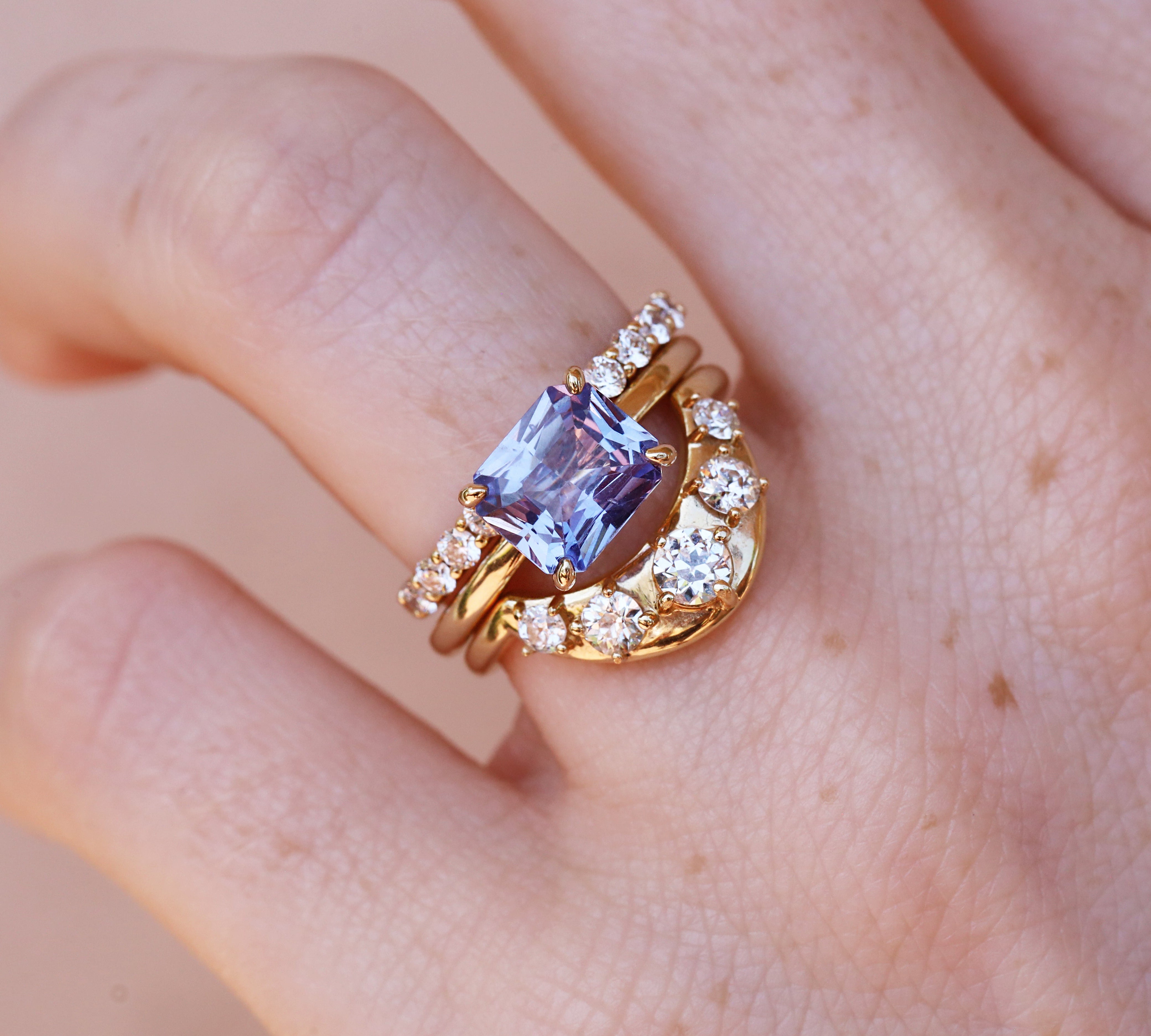 Purple Sapphire East-West ring on hand