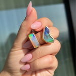 Hand holding two rings