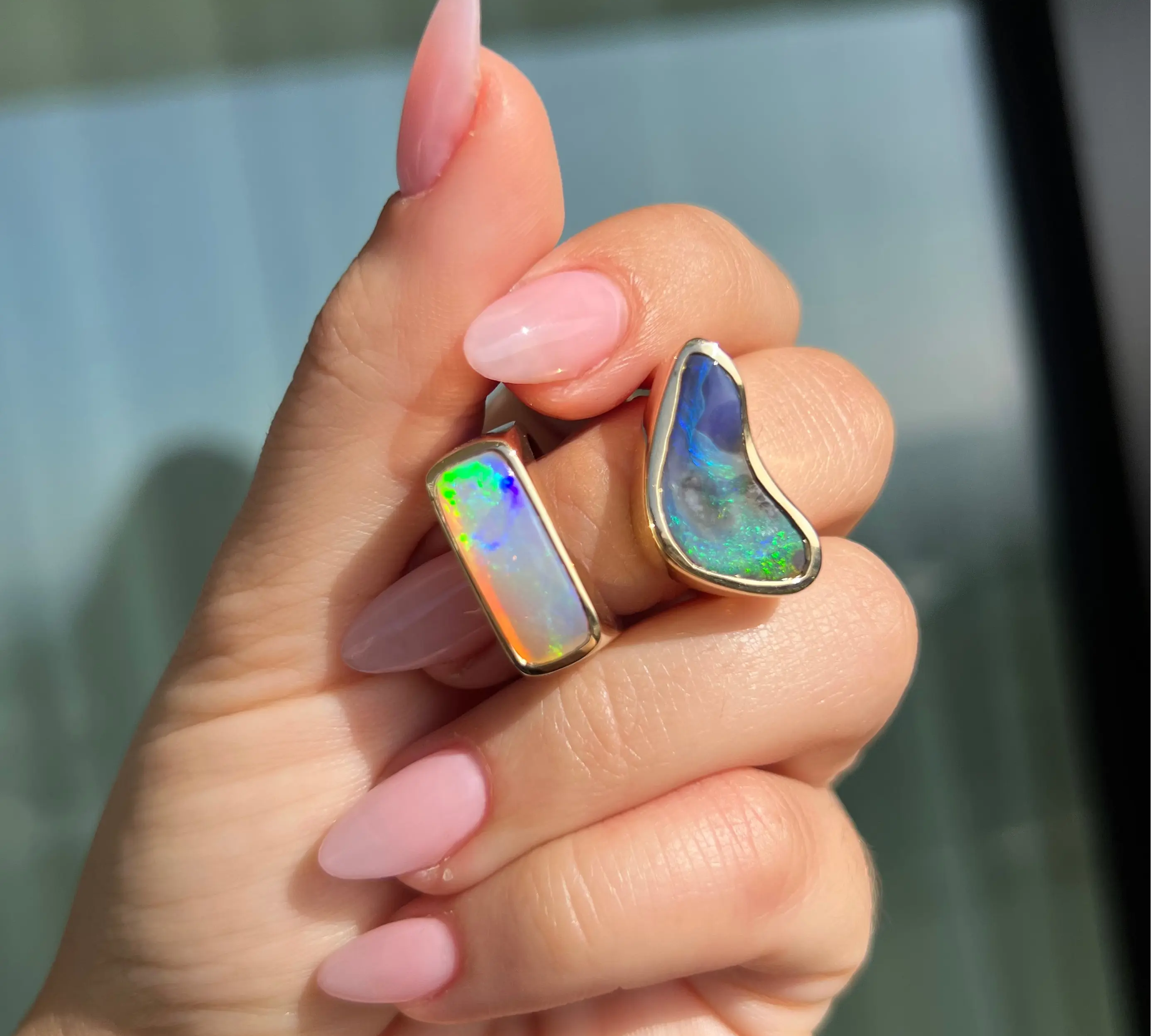 Hand holding two rings