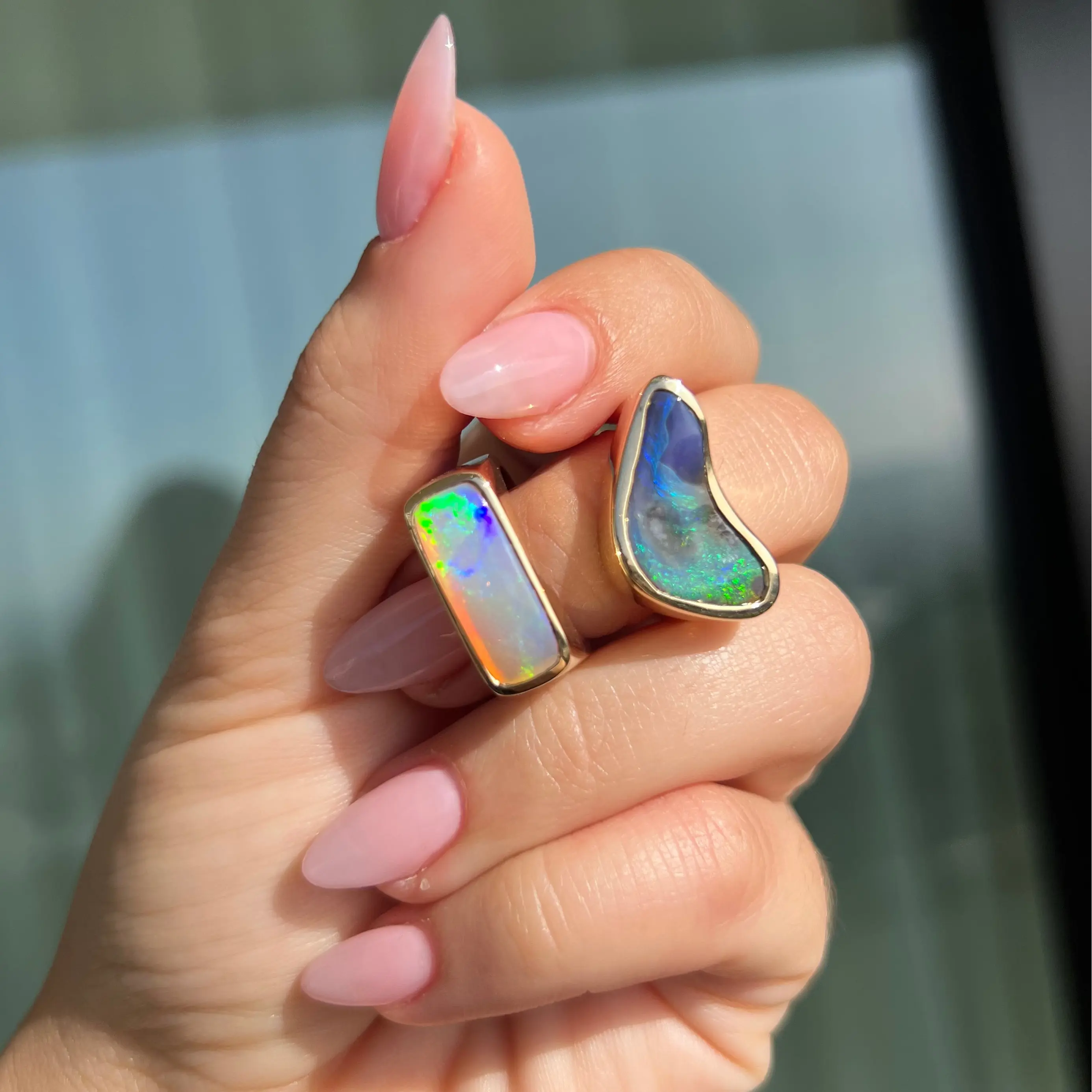 Hand holding two rings