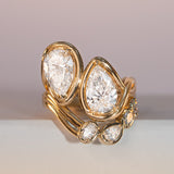 Joanie Bypass Ring + Simone Arch Band flat lay
