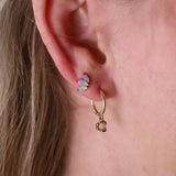 opal lotus studs and opal hoop earrings