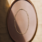 Flatlay of Lisse Tennis Necklace