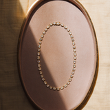 Flatlay of Lisse Tennis Necklace
