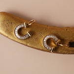 horseshoe charm with baguette diamonds on gold horseshoe