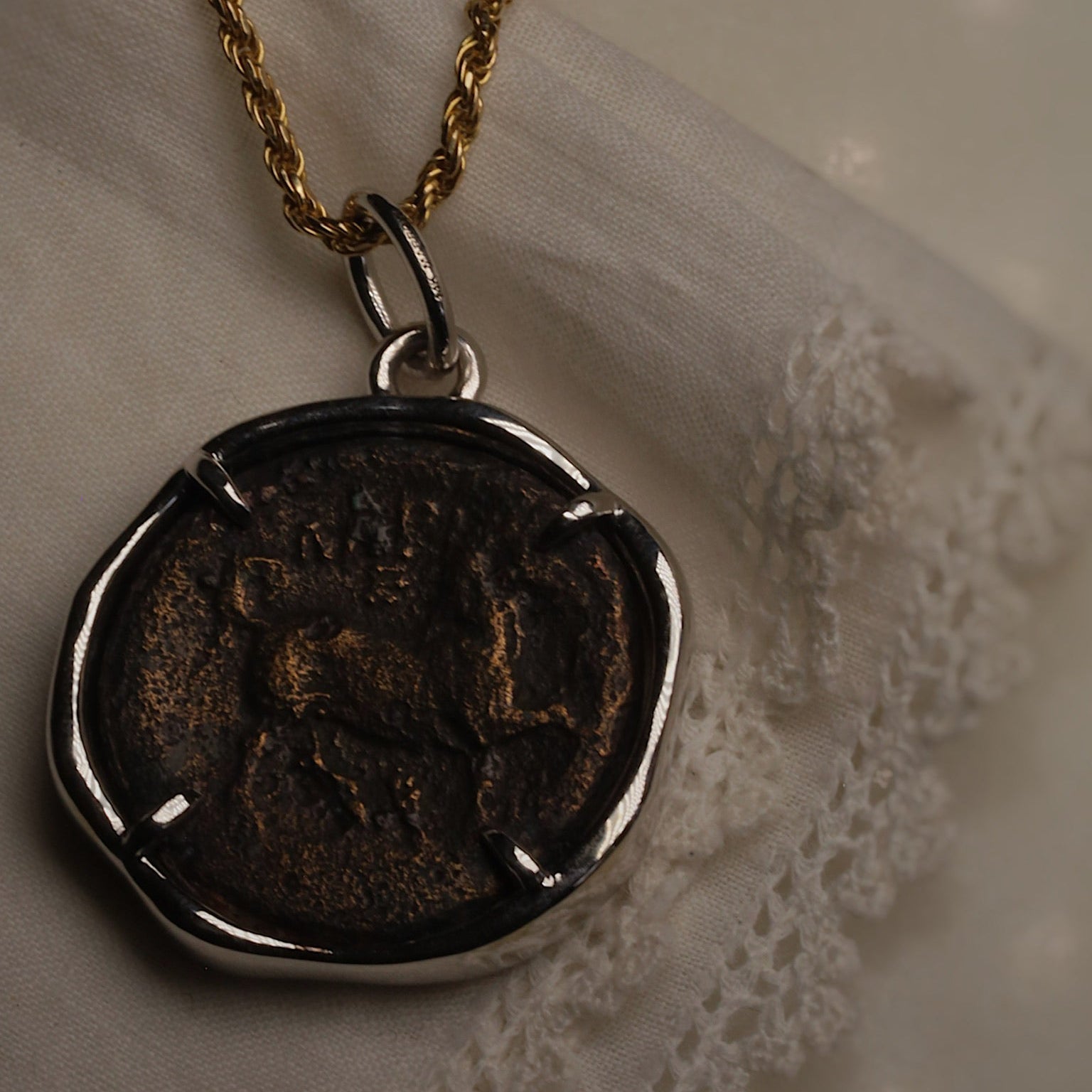 Larissa and Horse Bronze Coin Pendant worn on a chain, horse side facing out