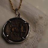 Larissa and Horse Bronze Coin Pendant worn on a chain, horse side facing out