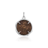Side view of the Larissa and Horse Bronze Coin Pendant showing the 14k white gold bezel and prongs