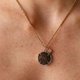 Larissa and Horse Bronze Coin Pendant worn on the neck, an ancient Greek bronze coin in a 14k white gold bezel