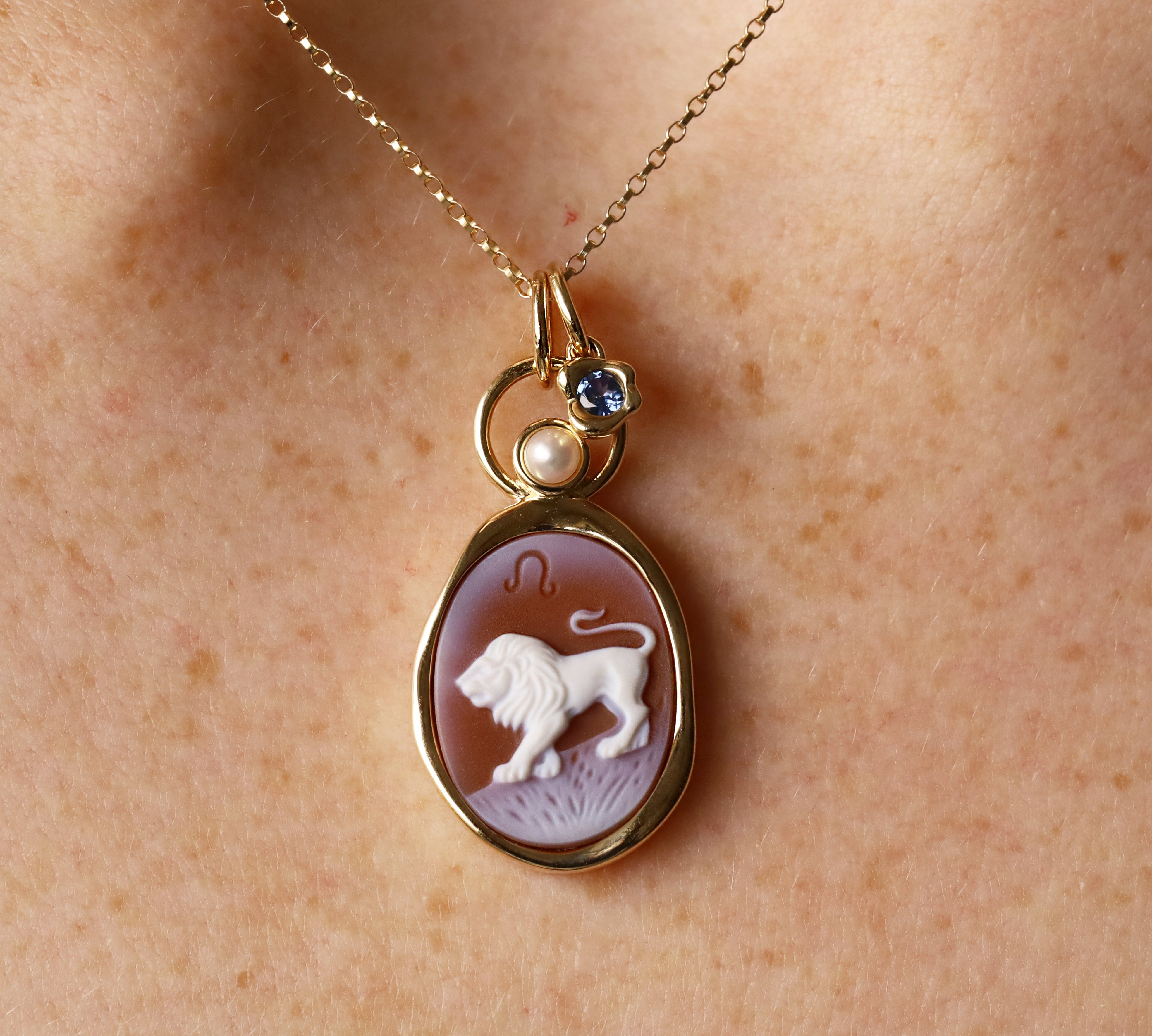 Leo Zodiac Orange Agate Carving with Pearl – white lion and Leo glyph carved on orange agate, set in 14k yellow gold