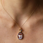 Leo Zodiac Orange Agate Carving with Pearl pendant in 14k yellow gold, a carved white lion with a floating cultured pearl