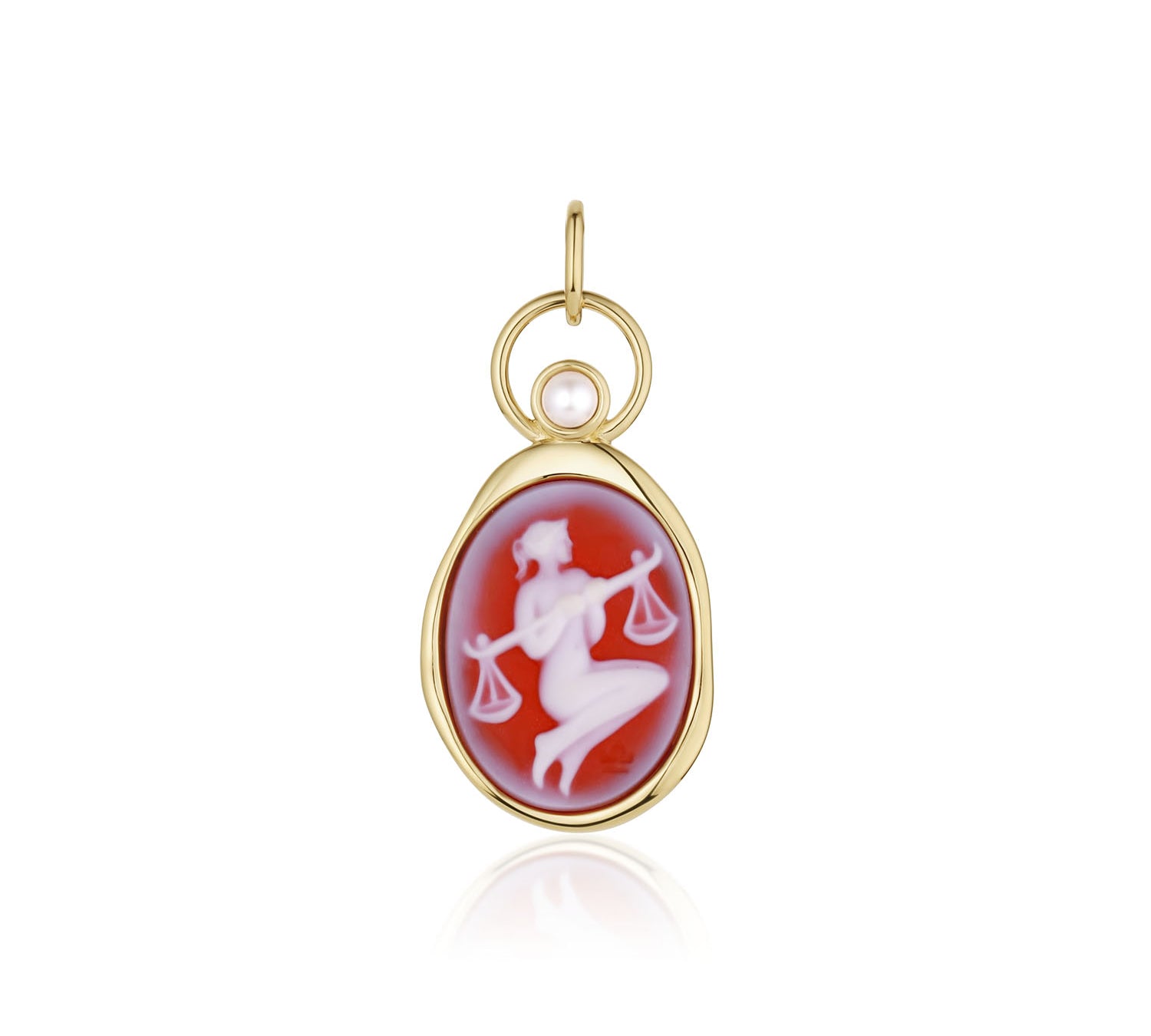 Libra Zodiac Orange Agate Carving with Pearl – white figure holding scales carved on orange agate, set in 14k yellow gold with a white pearl in an open gold ring, by Marrow Fine