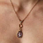 Libra Zodiac Orange Agate Carving with Pearl pendant – Libra holding her scales carved in white on orange agate in 14k yellow gold, with a white pearl floating in an open gold ring