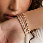 Wrist stacked with the Lisse Tennis Bracelet, Mini Lisse Tennis Bracelet, Evert Tennis Bracelet and Billie Tennis Bracelet