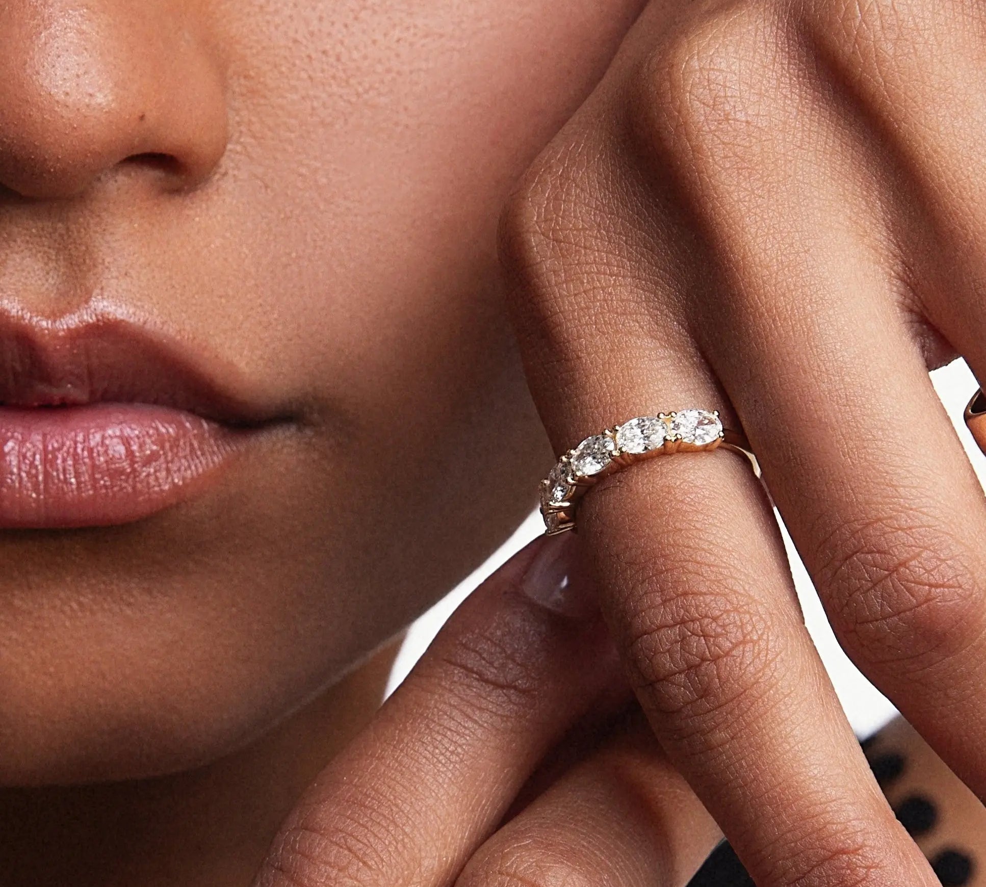 close up of ring featuring Marrow Fine's White Diamond East/West Liv Band
