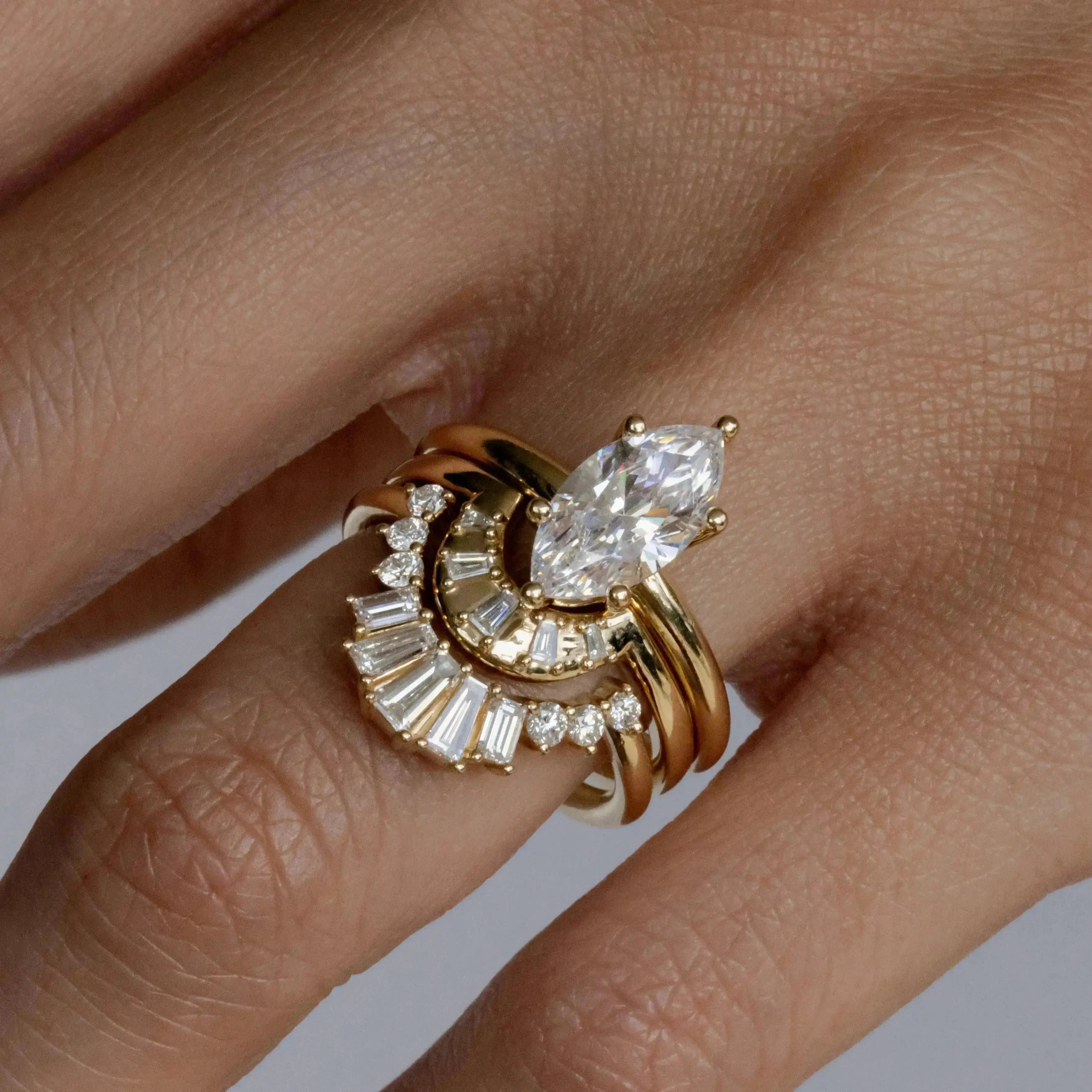 Sasha Ballerina Band with white diamonds stacked with a marquise engagement ring