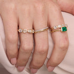 Close up of woman resting hands against chin with the Marrow Fine White Diamond Mixed Shape Bezel Band