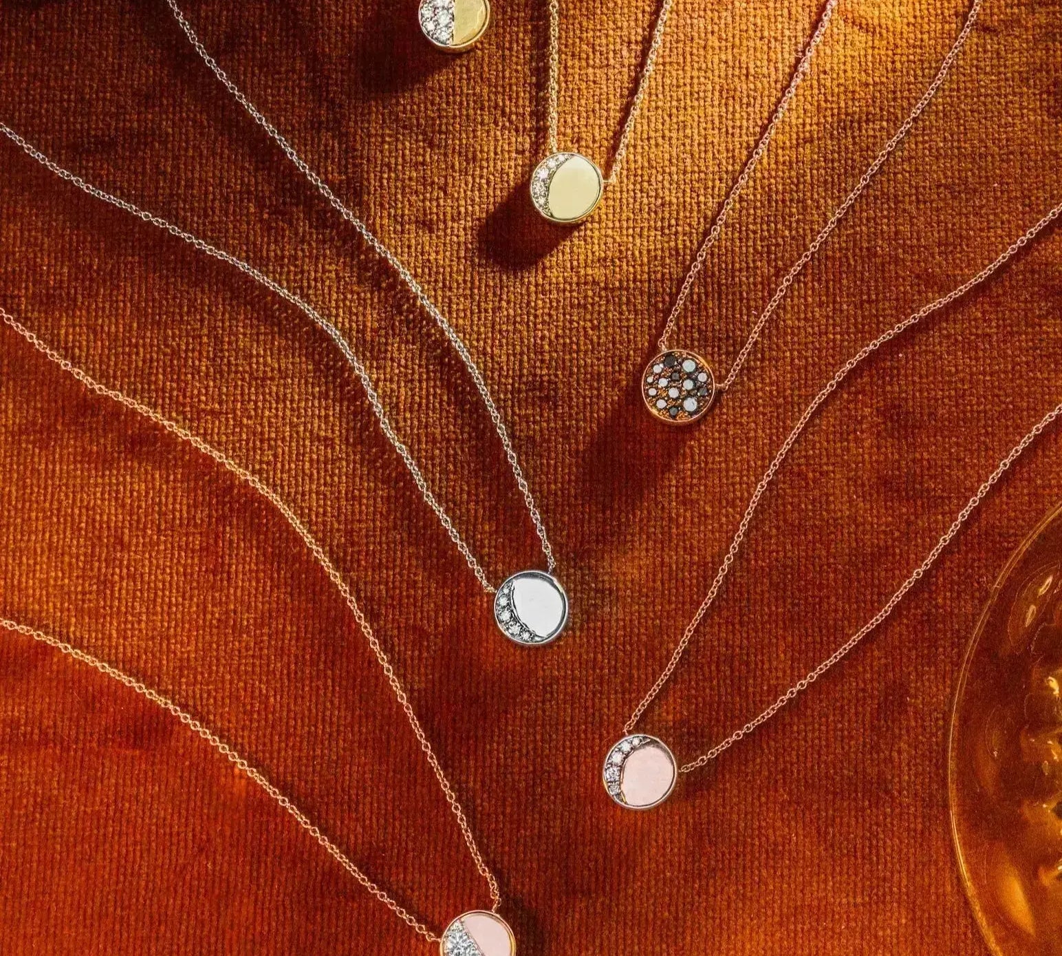 flat lay of all Moon Phase pendants