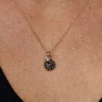 Necklace with a pendant worn on a person's neck