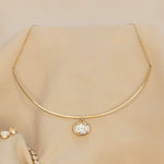 Odette Oval Collar flat lay 