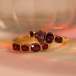 Flat lay of 1.00tcw Ruby and 0.90ct Sapphire Linear Band and 1.20ctw Ruby Linear Band