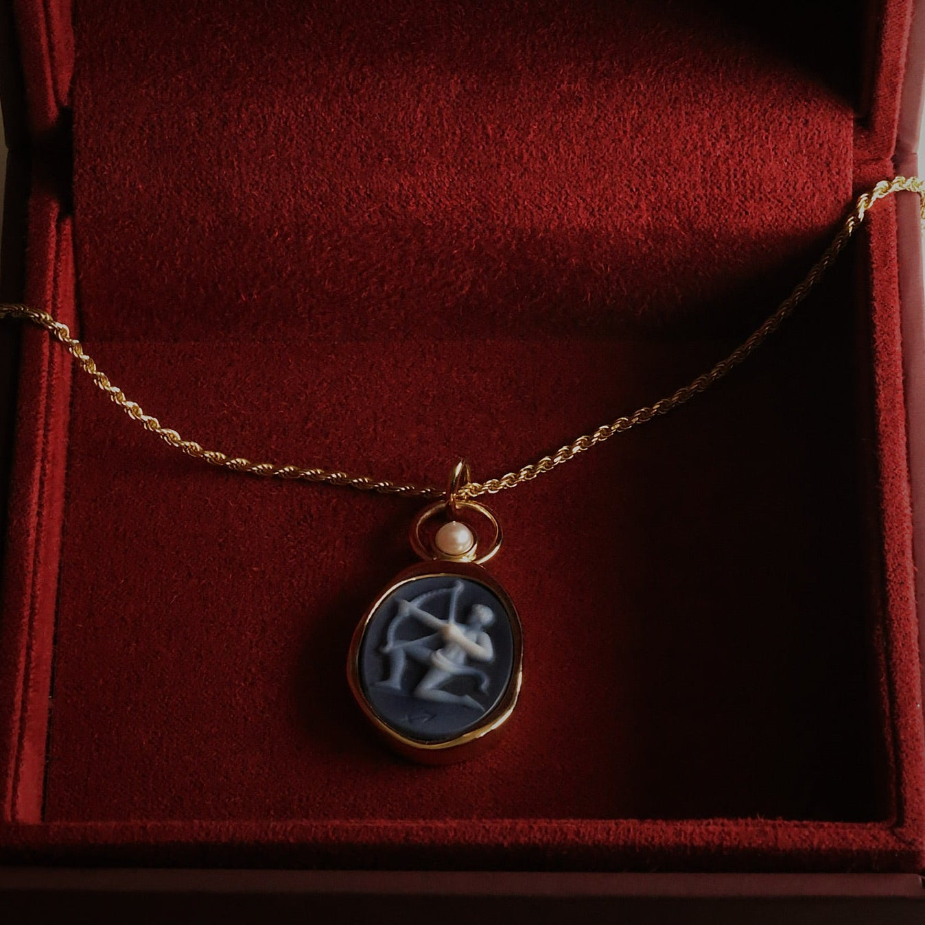 Sagittarius Zodiac black agate carving pendant in 14k yellow gold with a white pearl