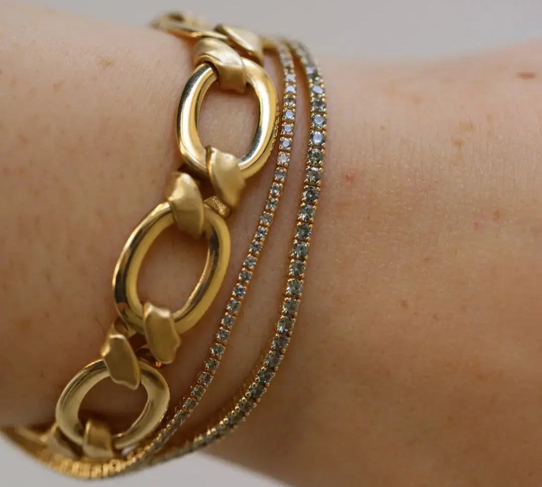 Close up of 2.90tcw Seafoam Sapphire Tennis Bracelet and 1.61tcw Seafoam Sapphire Tennis Bracelet on wrist