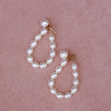 Teardrop Pearl Earrings flat lay