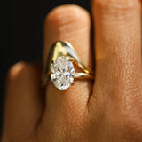 The Francesca Oval Engagement Ring close up on finger
