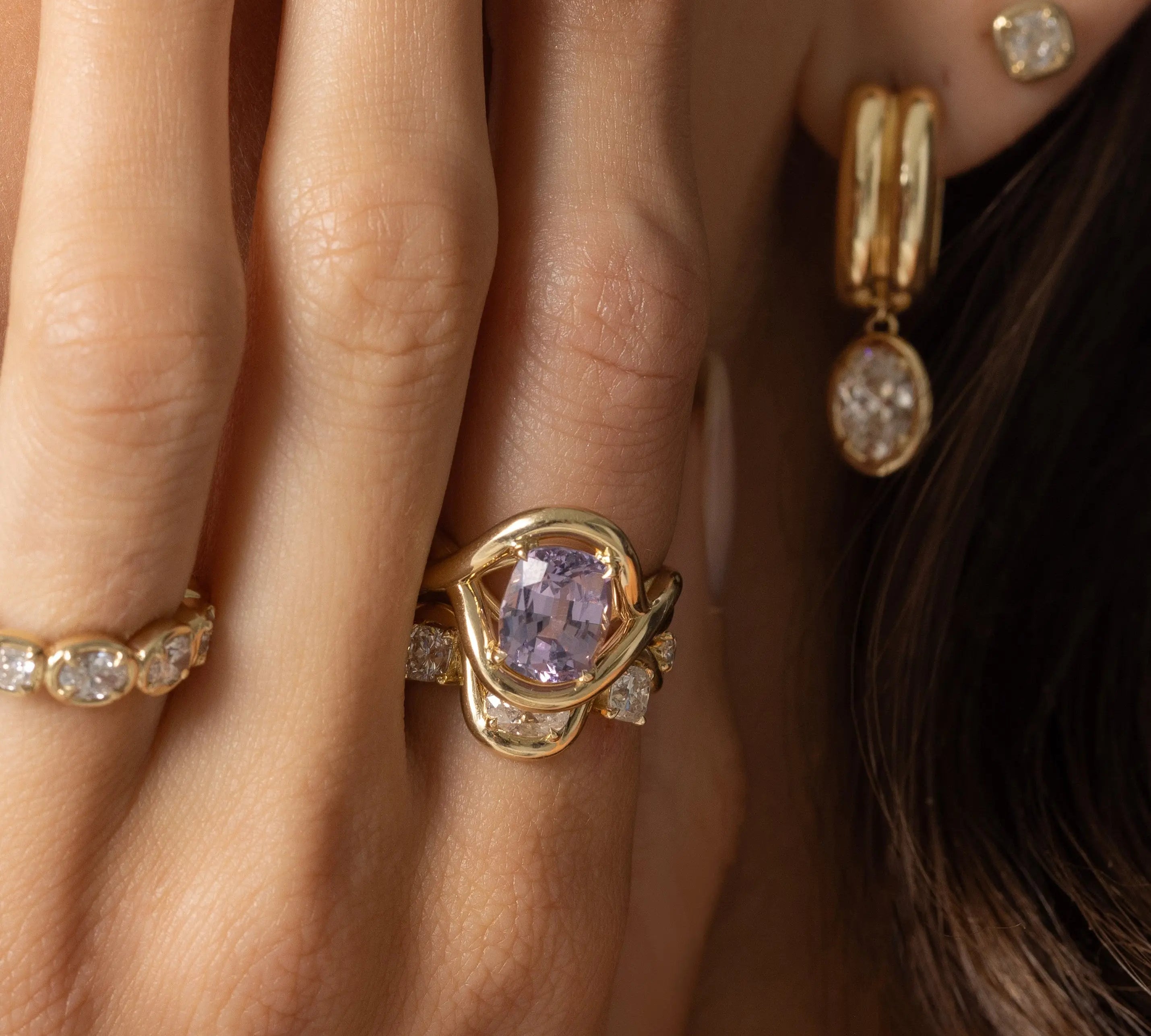Close up of 3.35ct Violet Spinel Marrow x Sammi Florence Ring on woman's hands