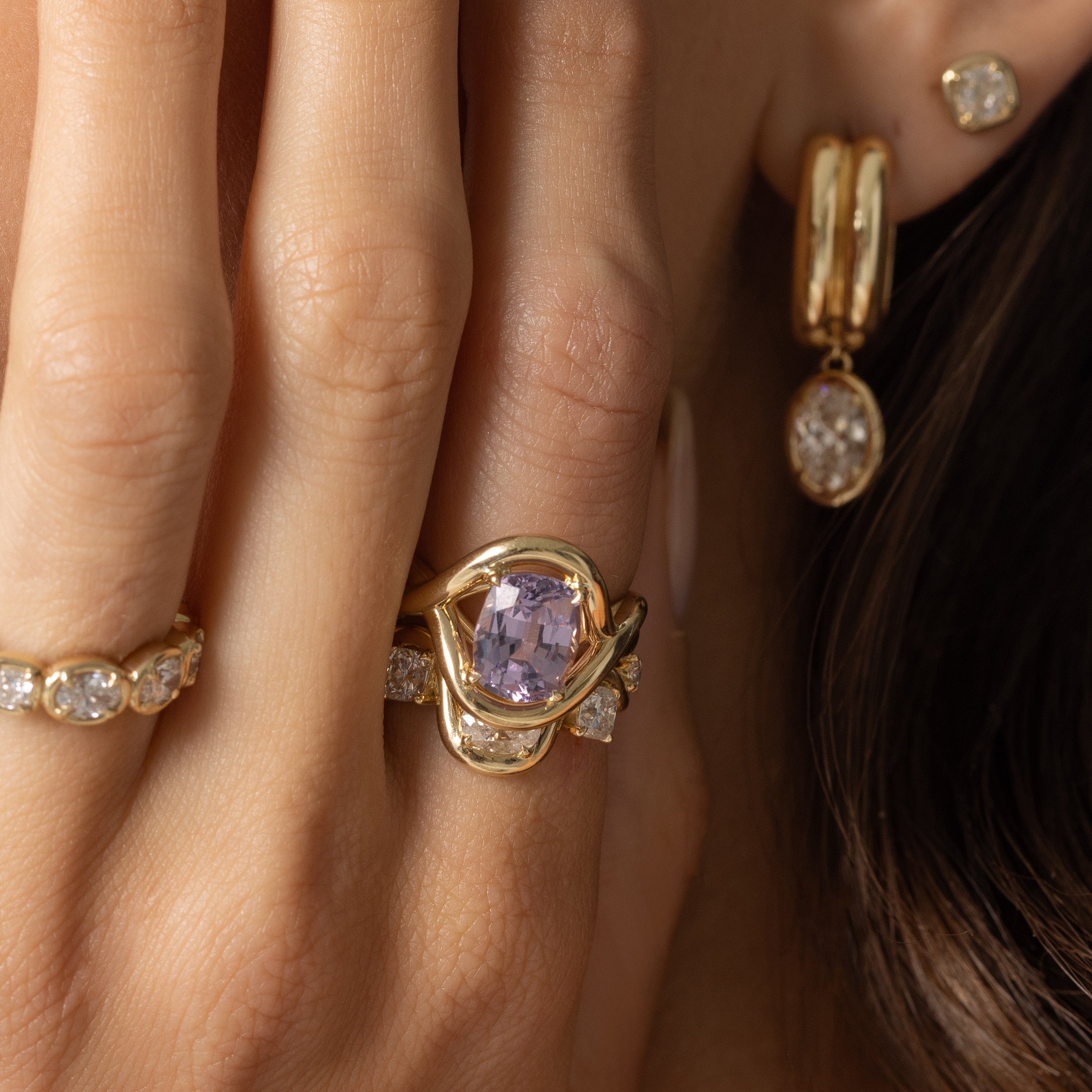 Close up of 3.35ct Violet Spinel Marrow x Sammi Florence Ring on woman's hands