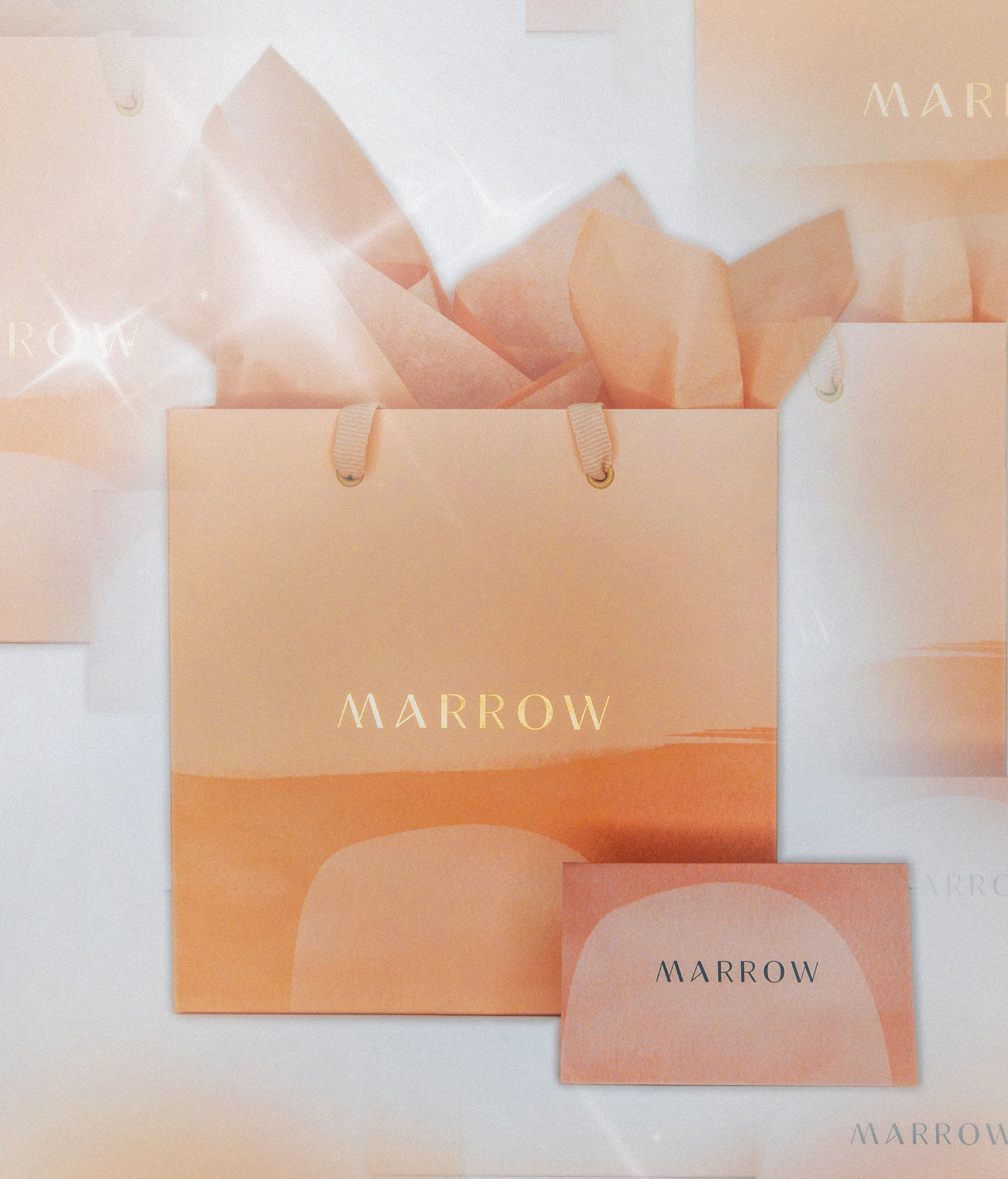 Marrow branded shopping bag and card on a soft pink background