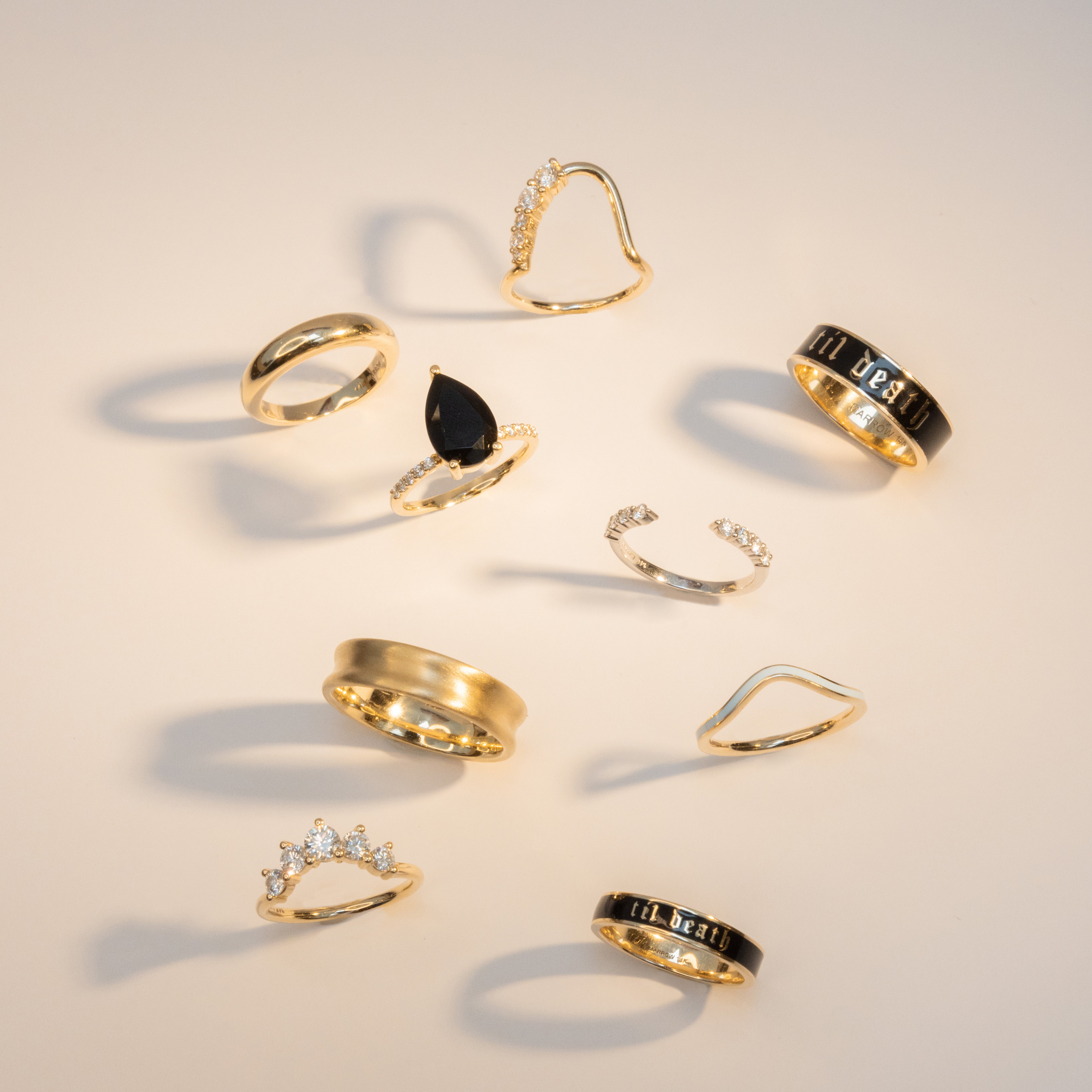 Flat lay of Marrow Fine best selling rings