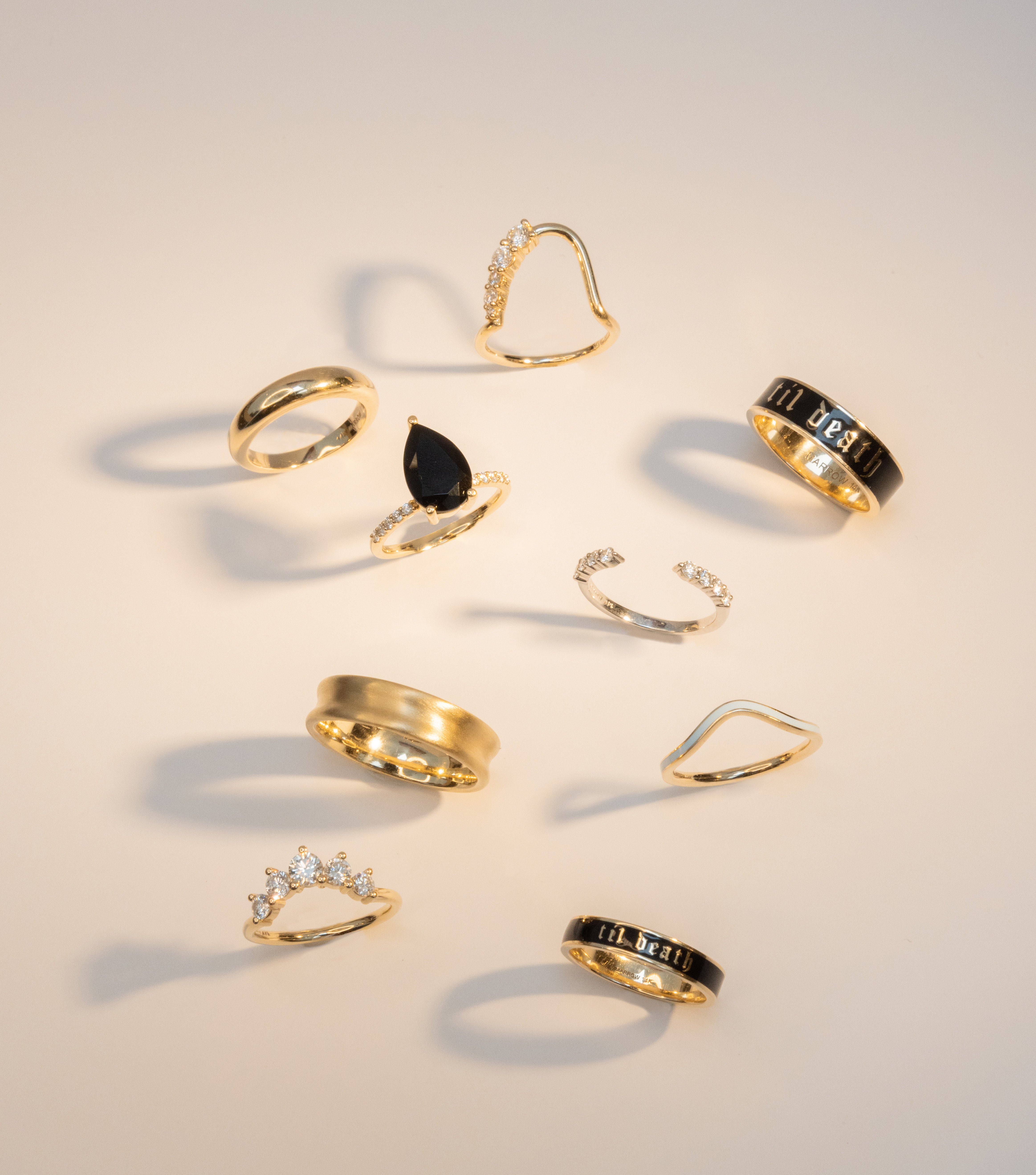 Flat lay of Marrow Fine best selling rings