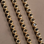 Black Diamond Bezeled Tennis Bracelet [flat lay]