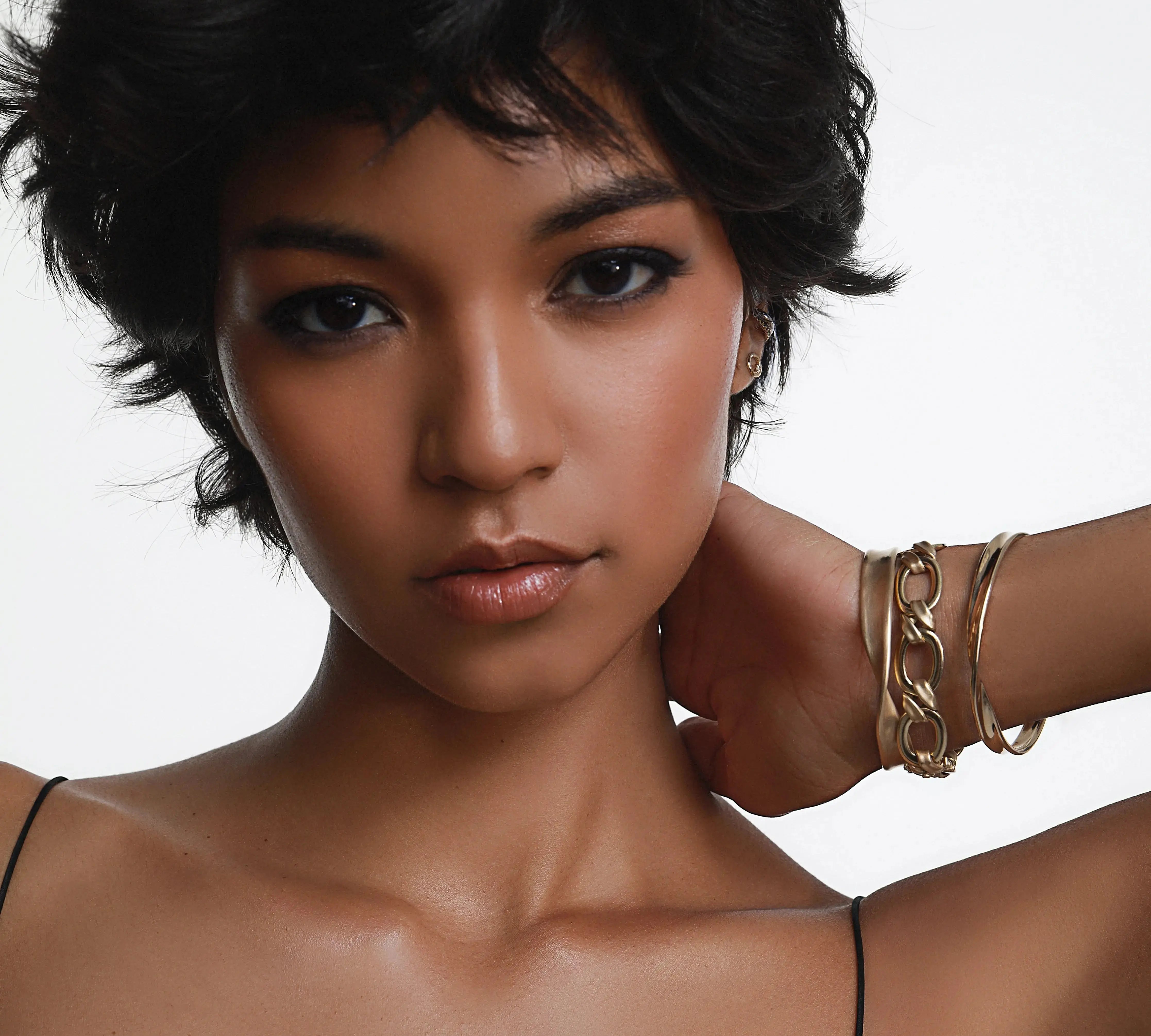 Everyday Twist Link Cuff + Mini Everyday Twist Link Cuff styled on model's wrist