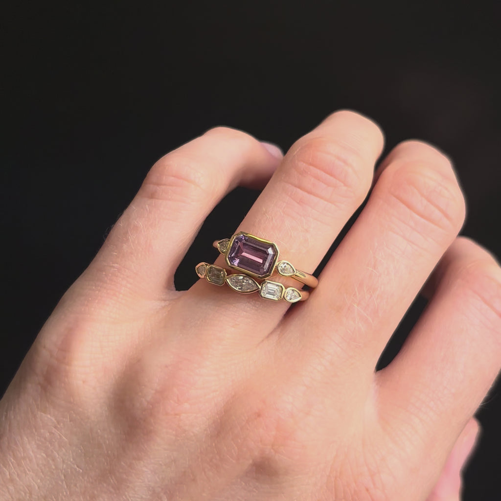 Close up of 1.59ct Sapphire and Diamond Ring with Tracer Band on hand