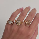 Video of 2.76ct Old Mine Marquise and two other diamond rings on hand