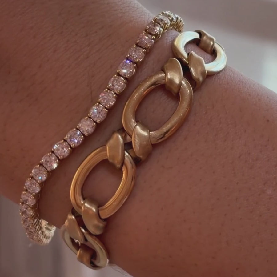 Video of Billie Diamond Tennis Bracelet and yellow gold Twist Link Chain Bracelet on woman's wrist close up