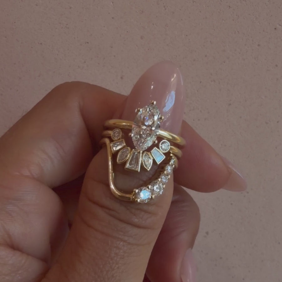 Video of the White Diamond Victoria Bezel Ballerina Band and White Diamond Lucy Wave Band stacked with a diamond engagement ring