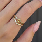 Video of 0.57ct Montana Sapphire Kite Linear Band stacked, close up of hand