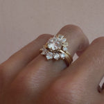 Video of the Curvy White Diamond Headdress Jacket and White Diamond Victoria Bezel Ballerina Band stacked with a diamond engagement ring on hand