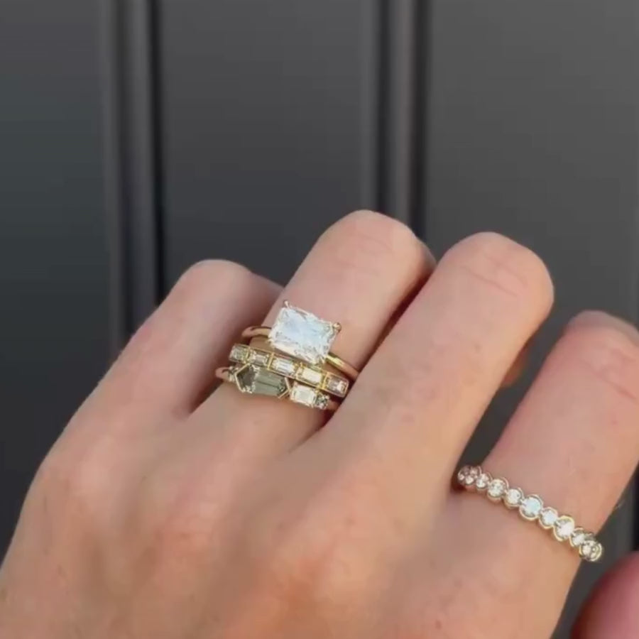 0.72ct Sapphire and Diamond Linear Band video styled on hand with other diamond and gold rings