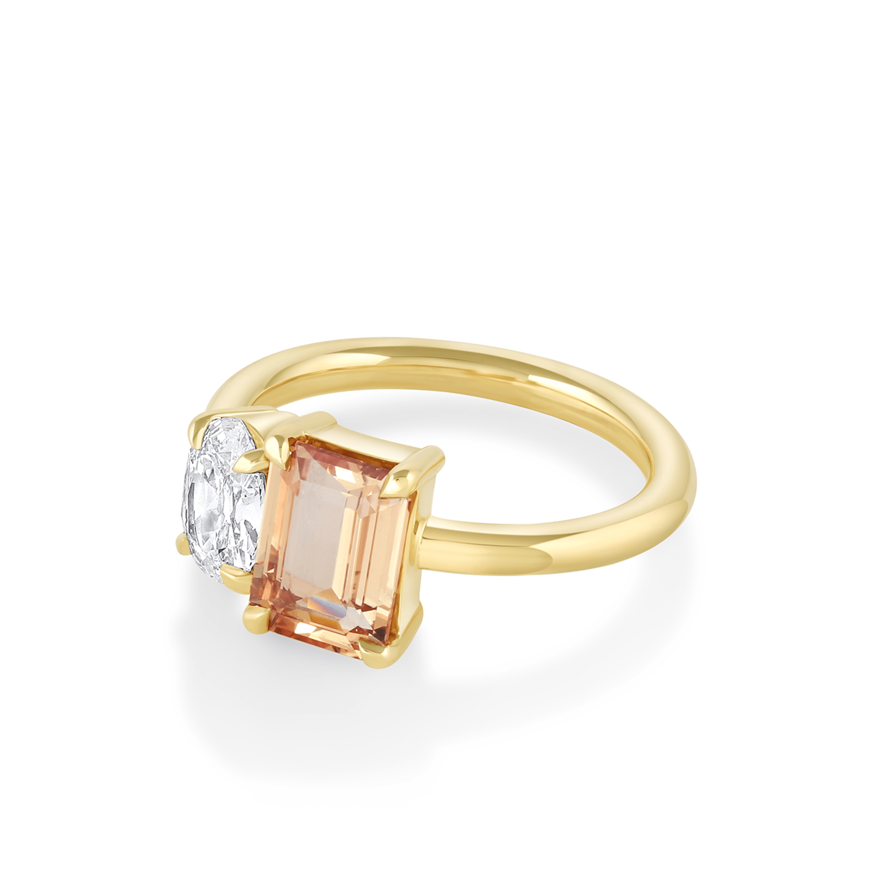 Features a 2.01ct natural peach sapphire emerald cut & .68ct F/SI1 hybrid oval
